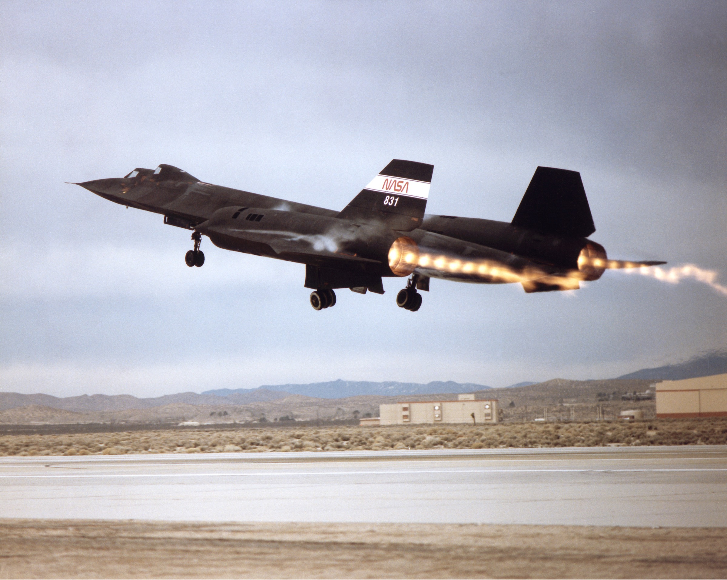 NASA's SR-71B, 831, leaves the runway at Edwards with shock diamonds in both exhaust plumes, 1992.
